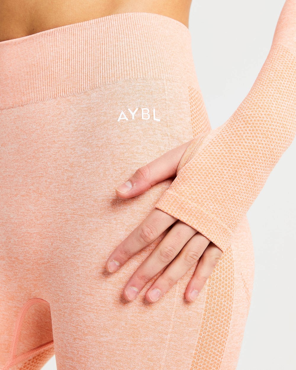 AYBL Motion Seamless Long Sleeve Crop Top Peach Marl | 948-KBYMIT